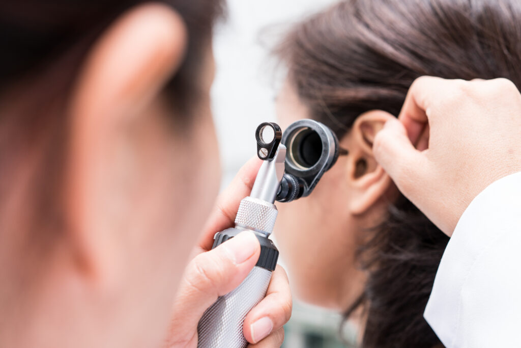DoctorExaminedThePatientsEarWithOtoscopePatientSeemTo - Dr. Manasi Mehra
